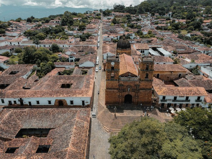 Traditional courtyard with trees in a Colombian-style heritage building
